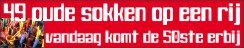 49 oude sokken op een rij vandaag komt de 50ste erbij
